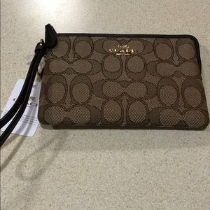 Coach NWT wristlet purse with gift box.